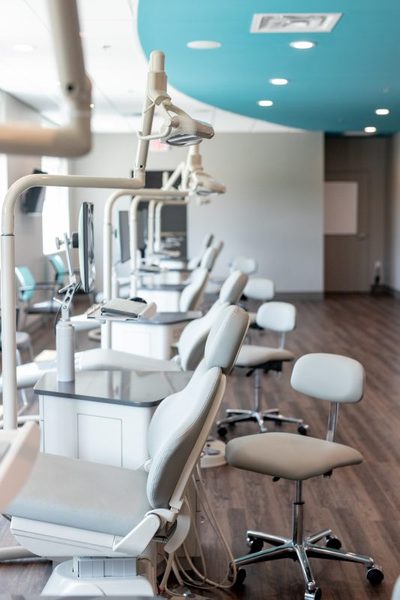 Treatment bay with dental chairs ready for patients